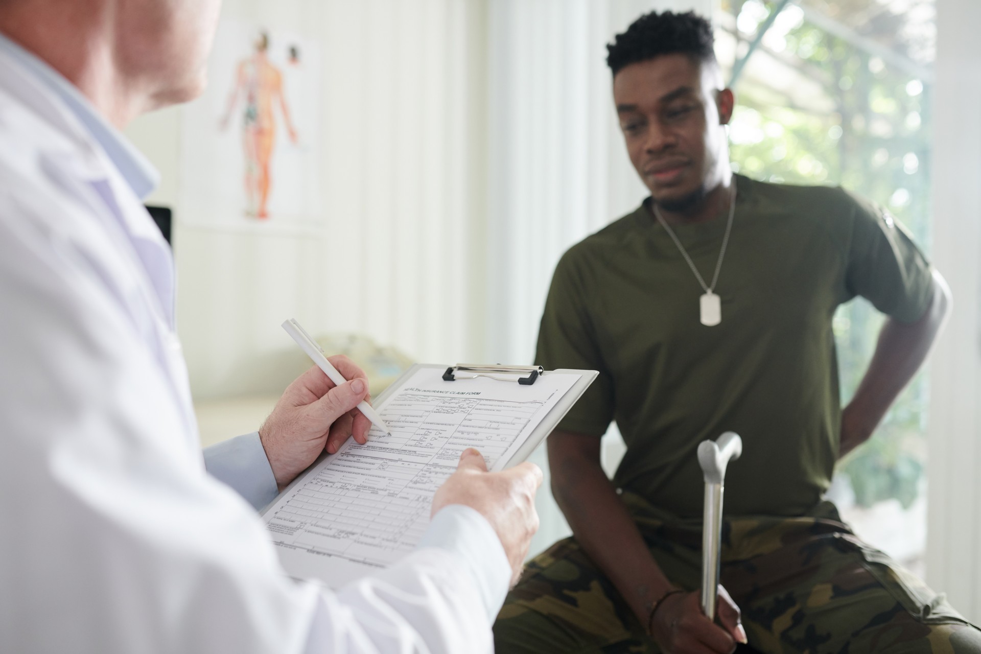 Doctor Filling Medical Document